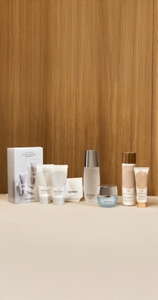 SENSAI bestsellers and picks for summer adventures shown next to each other in summer mood lighting